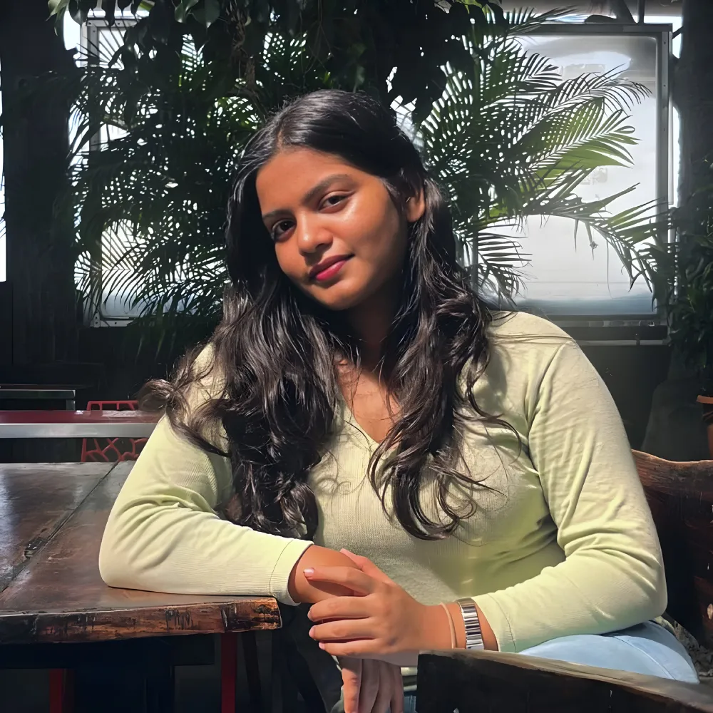 Neha S Babu, Performance Marketing Specialist in Kerala sitting at a cafe